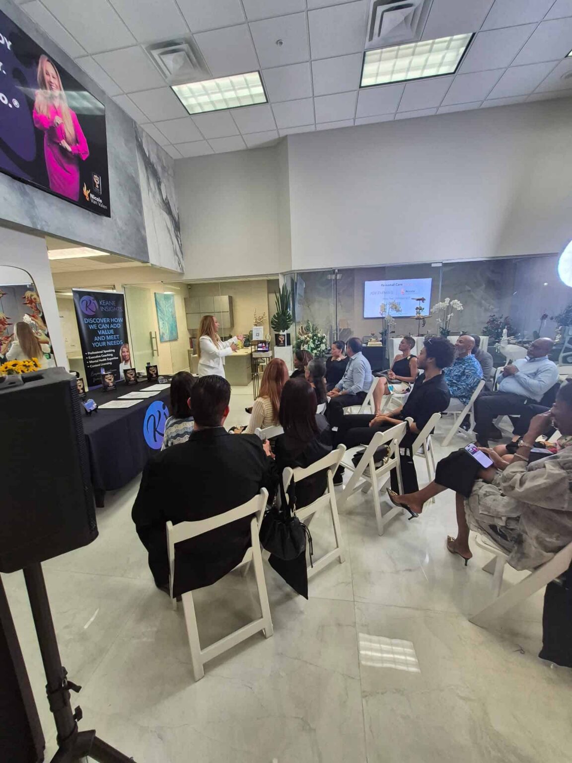 Nicole Van Valen in conversation with a group of leaders in a workshop setting