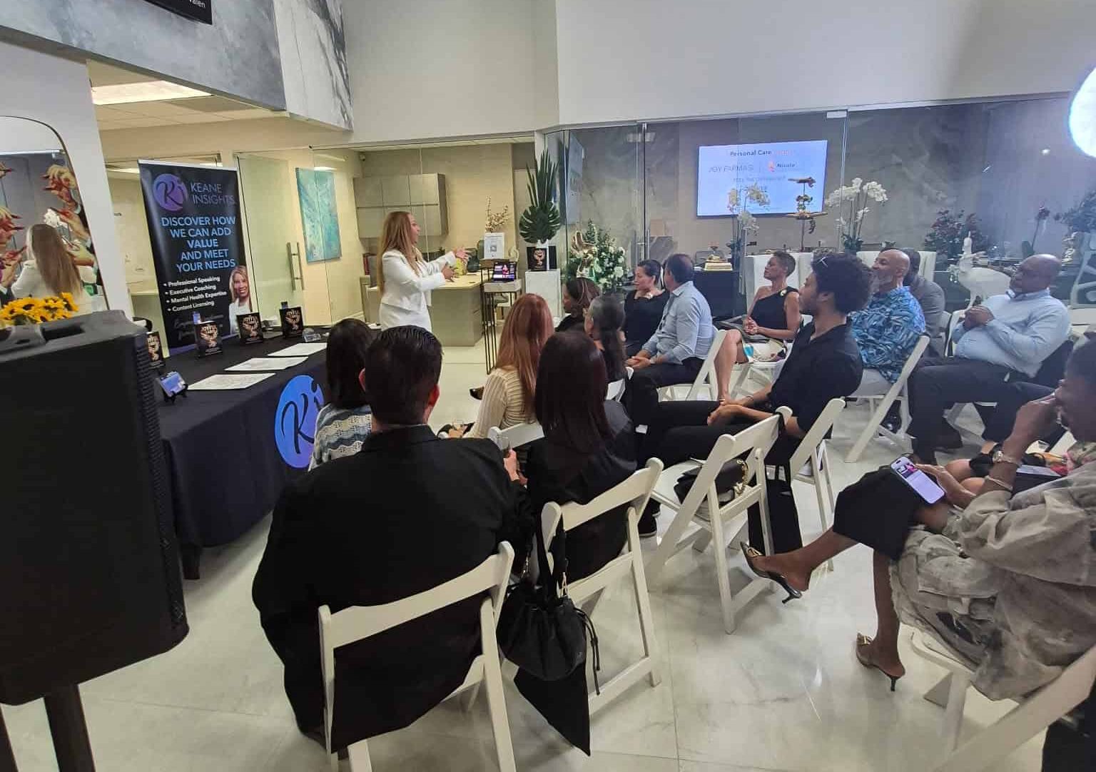 Nicole Van Valen in conversation with a group of leaders in a workshop setting