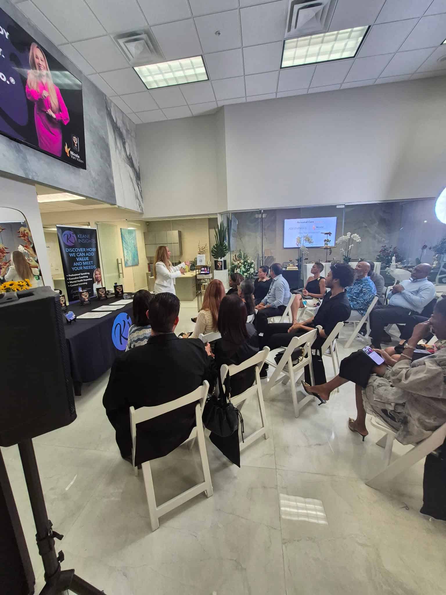 Nicole Van Valen in conversation with a group of leaders in a workshop setting